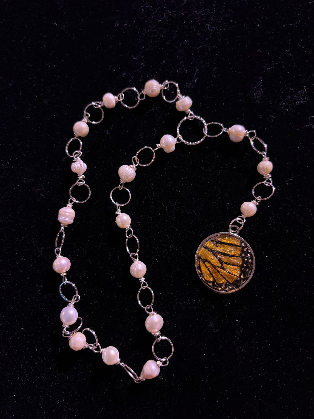 Genuine monarch wing pearl necklace