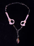 Racoon pelvis and labradorite necklace