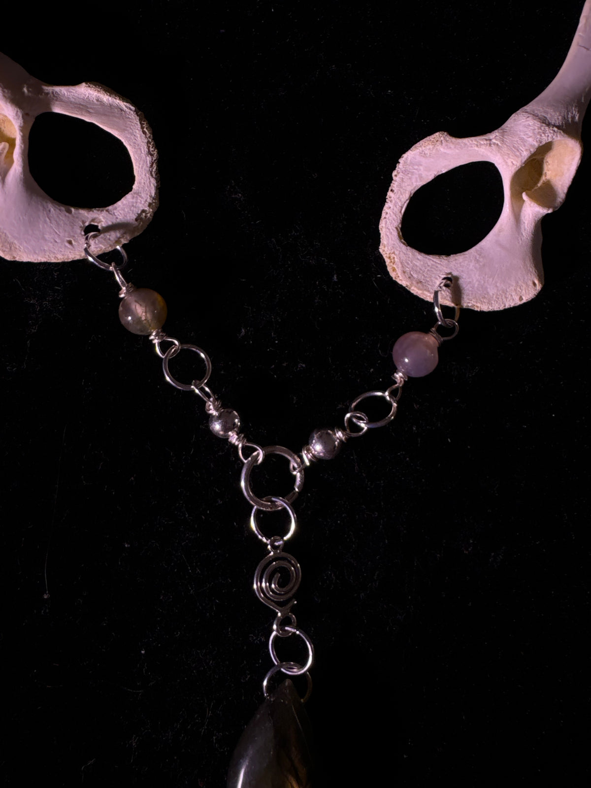 Racoon pelvis and labradorite necklace