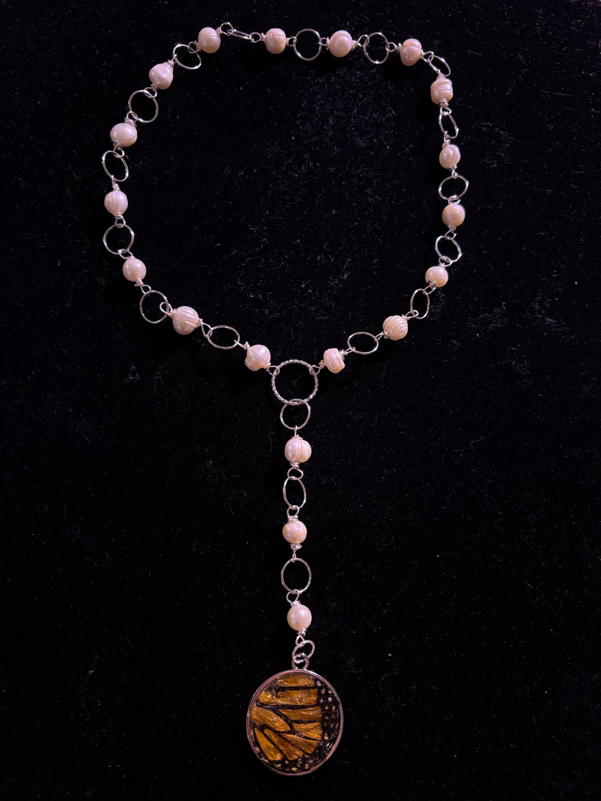 Genuine monarch wing pearl necklace