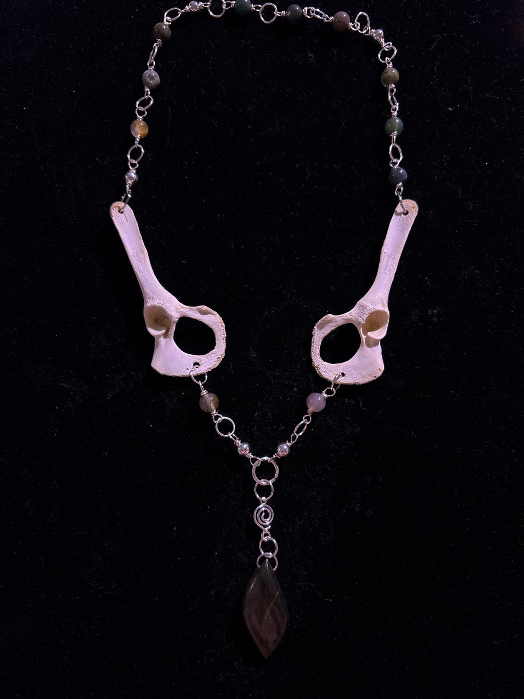 Racoon pelvis and labradorite necklace