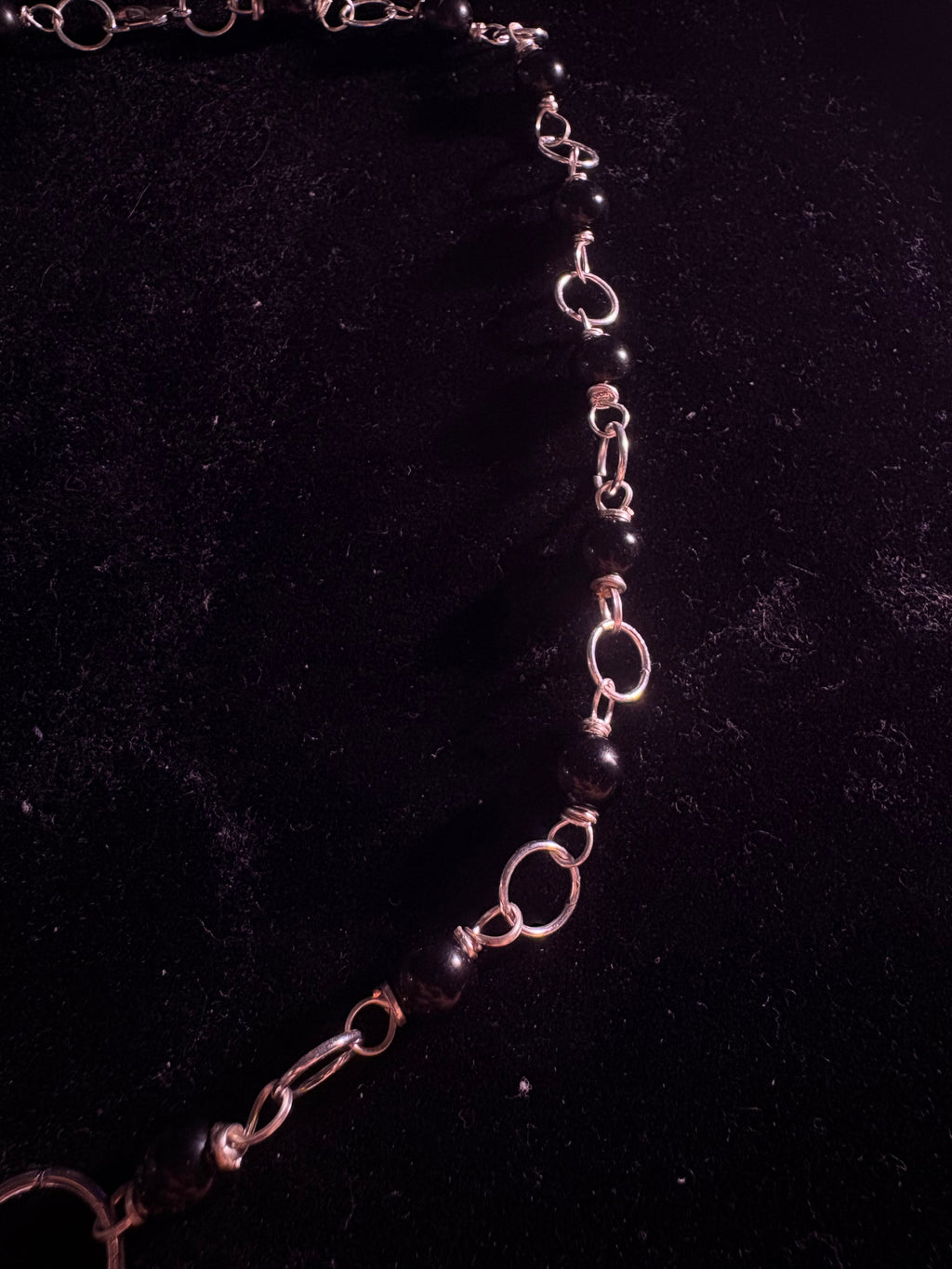 Human tooth rosary