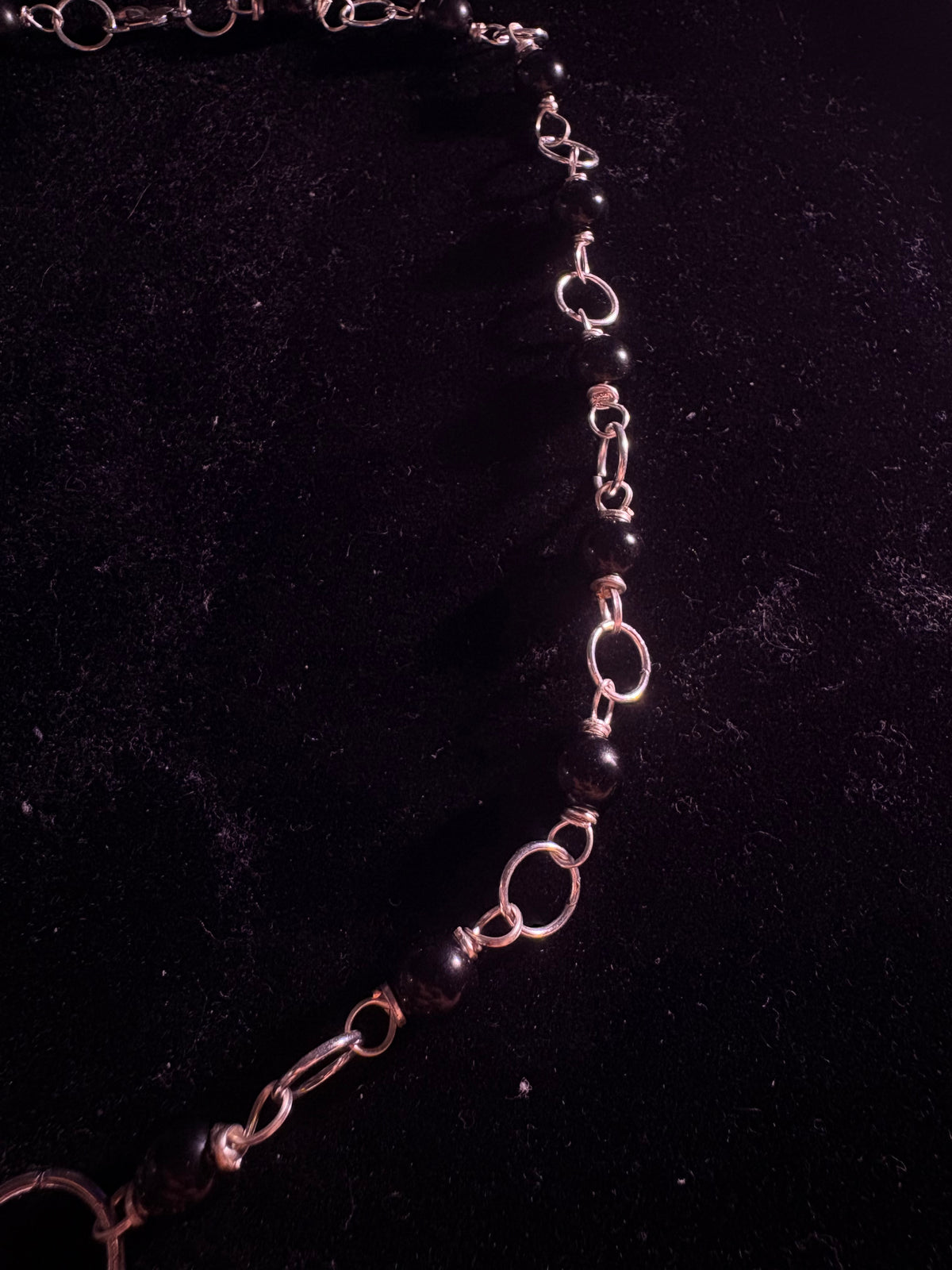Human tooth rosary