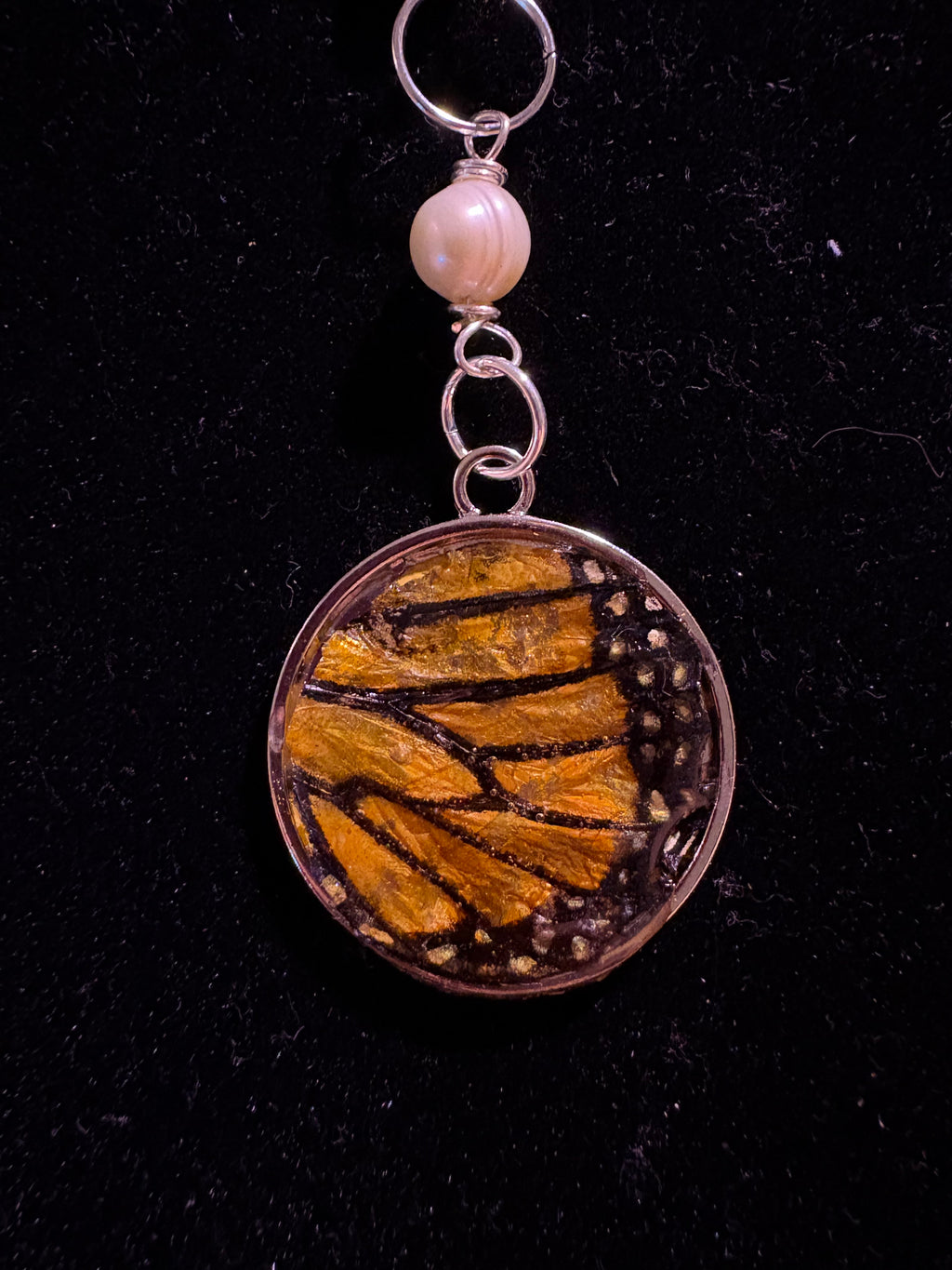 Genuine monarch wing pearl necklace