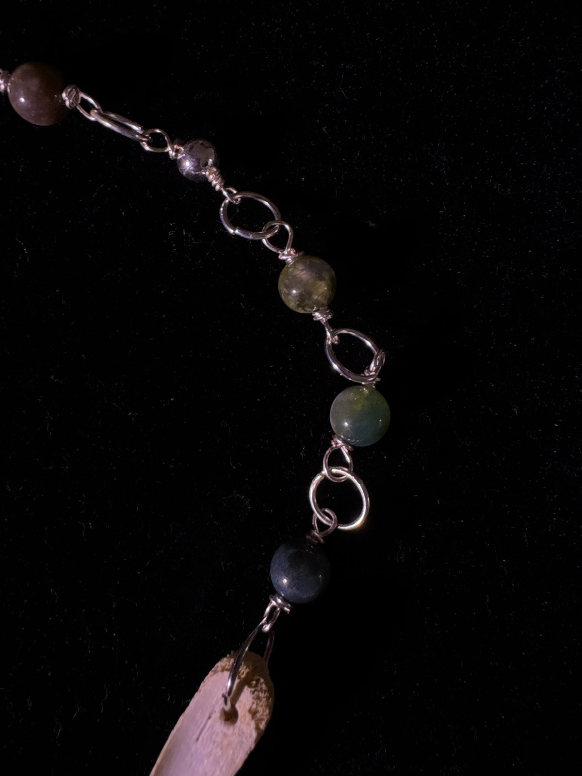 Racoon pelvis and labradorite necklace