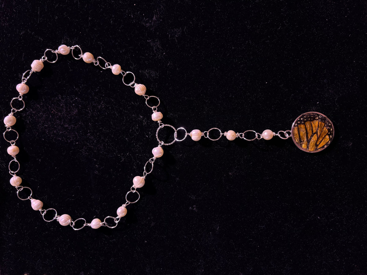 Genuine monarch wing pearl necklace