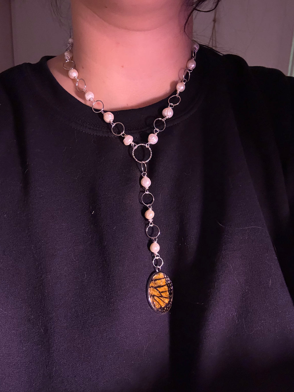 Genuine monarch wing pearl necklace