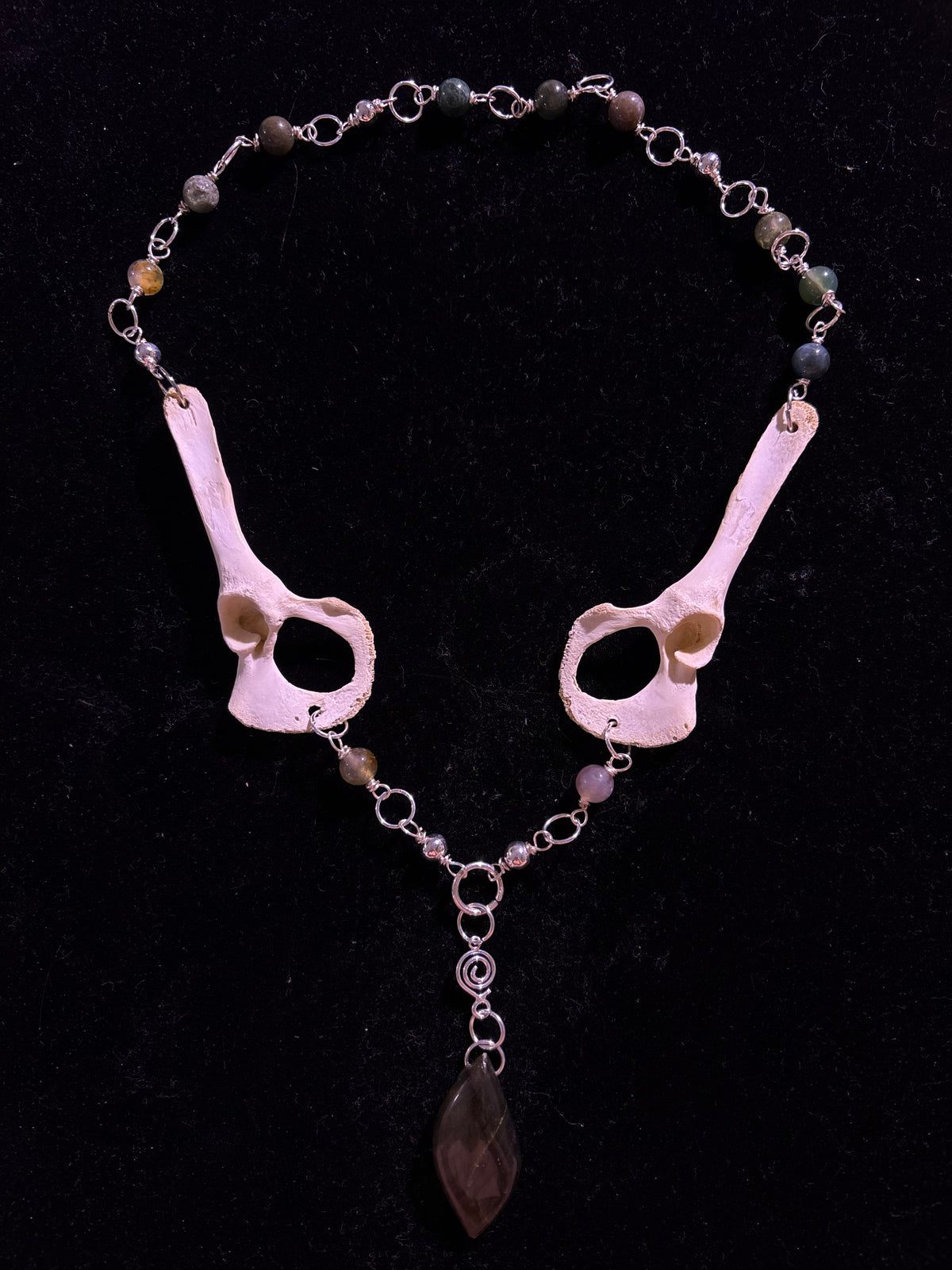 Racoon pelvis and labradorite necklace
